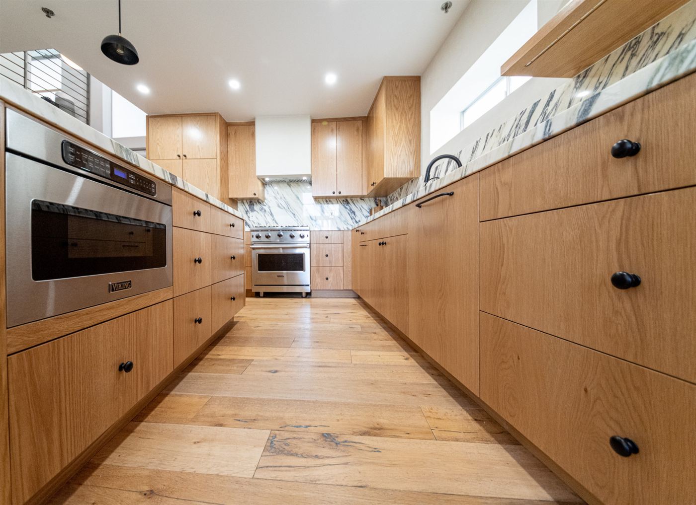 Marina del Rey kitchen remodel — warm wood cabinetry with clean modern lines, by ARKO Remodeling