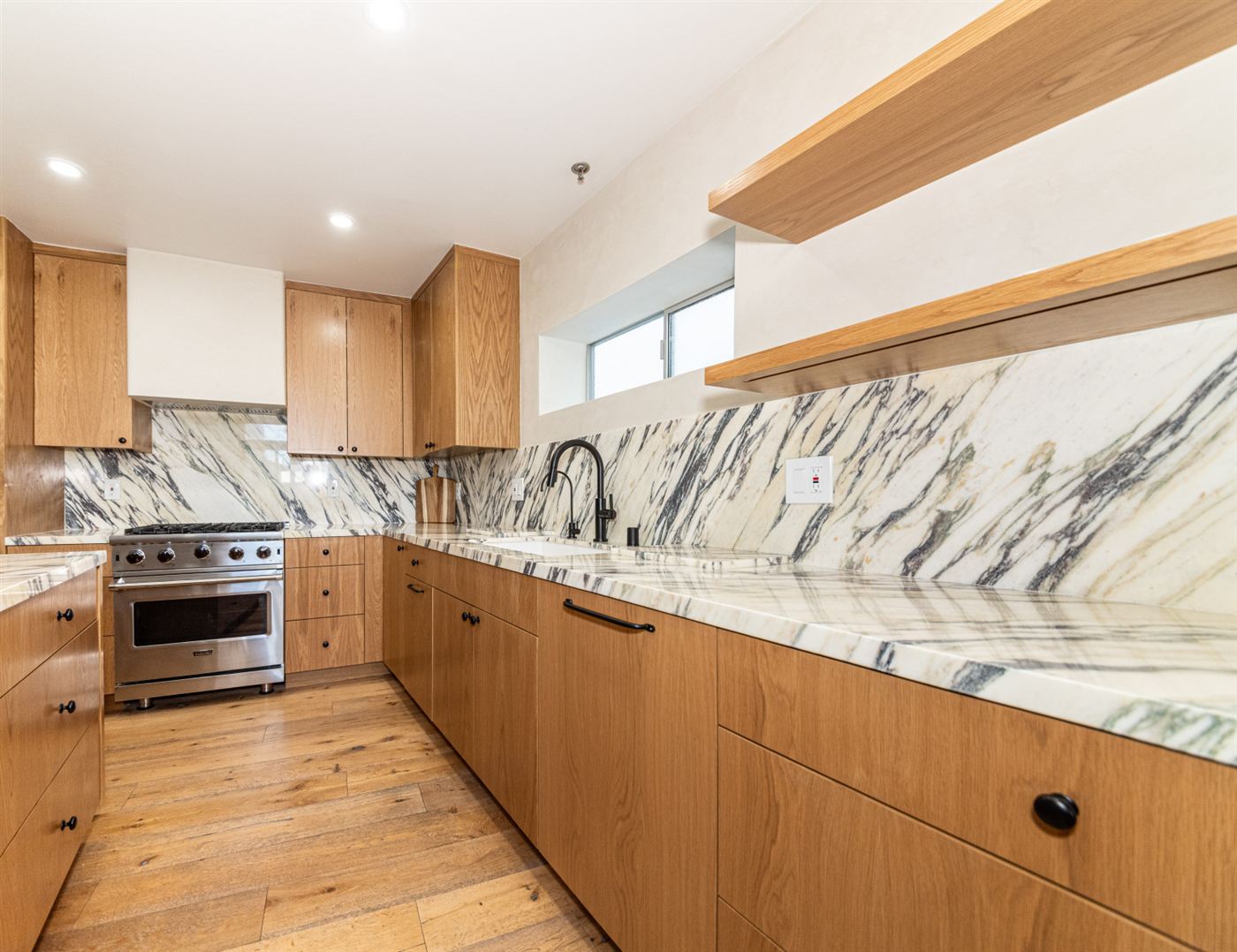Marina del Rey kitchen remodel — warm wood cabinetry with clean modern lines, by ARKO Remodeling