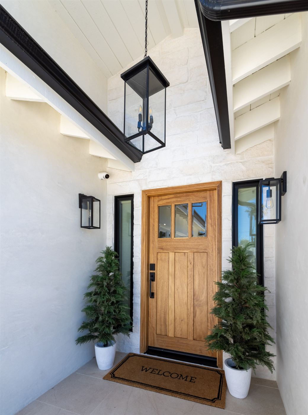 House entrance with white brick exterior