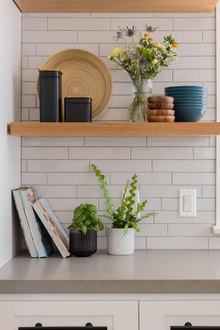 Kitchen detail — blue cabinets with black hardware