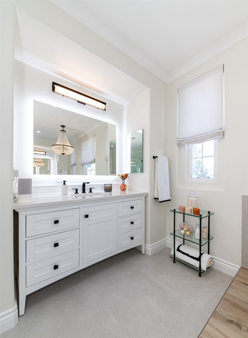 Westlake Village bathroom remodel — freestanding tub on wood platform with matte black fixtures